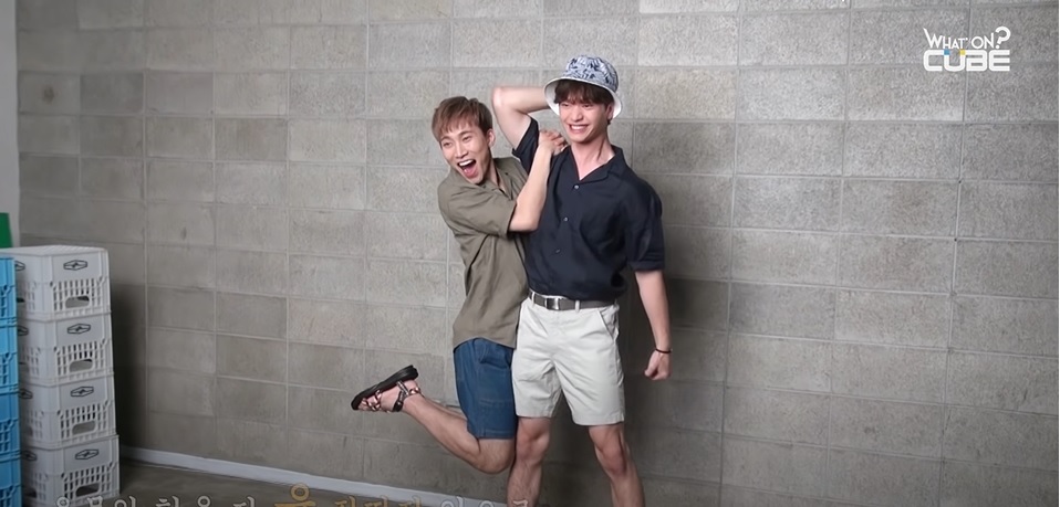 Eunkwang hangs from Sungjae's arm