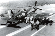 https://i.postimg.cc/GB3m7wY4/F4-U-7-Corsair-French-Navy-Flottille-17-F15-is-being-pushed-onto-t.jpg