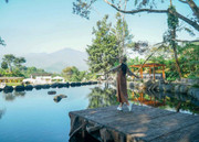 Visitor facing the pool at Telaga Madiredo