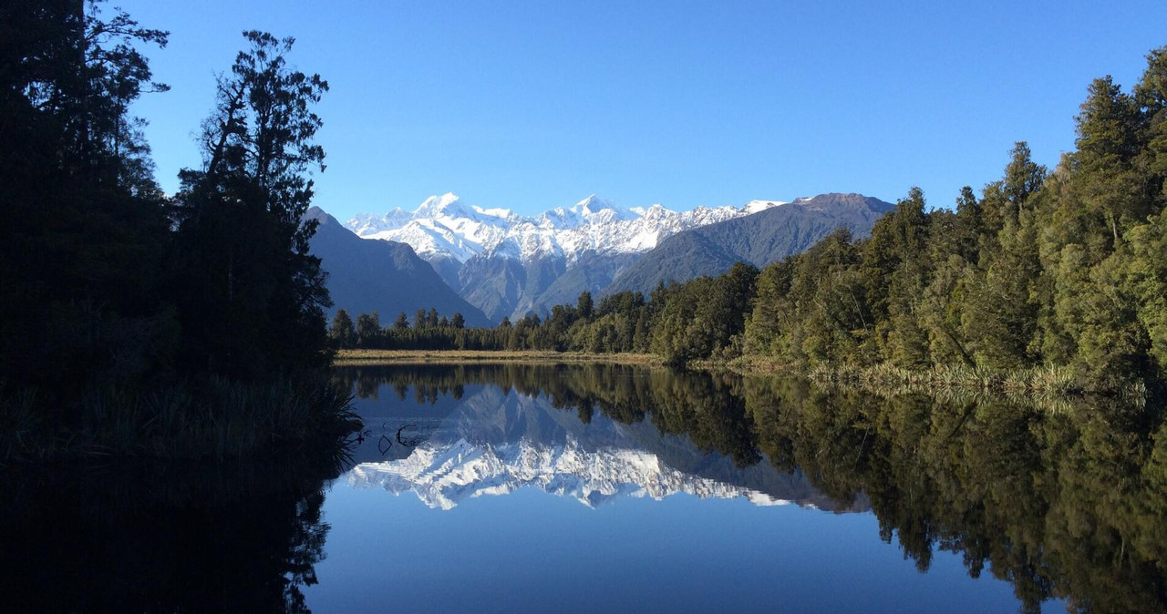 Lake-Matheson-West-Coast-credit-Glacier-Country-Eco-Tours-1-1__aWxvdmVrZWxseQo_CropResizeWzE5MDAsMTA