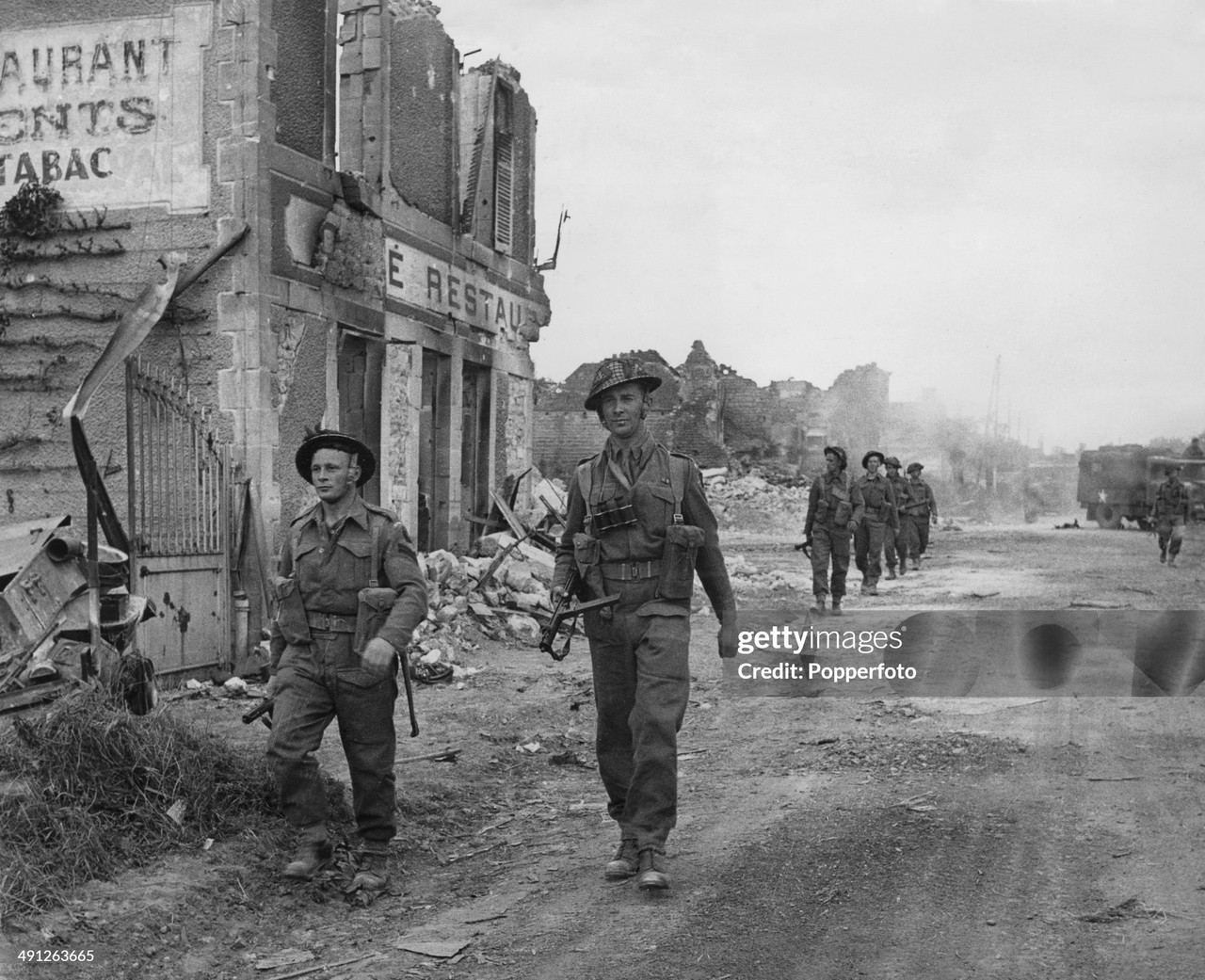 6 british soldiers village of Douet following the capture of Bayeux during the Battle of Normandy