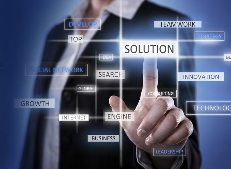 Office workers with a smartphone and a document working on a project, a laptop nearby