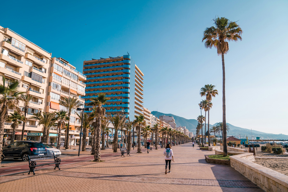 Fuengirola coastline and wide sandy beach at sunset