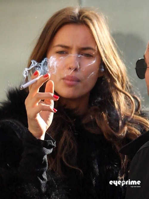 Irina Shayk smoking a cigarette (or weed)
