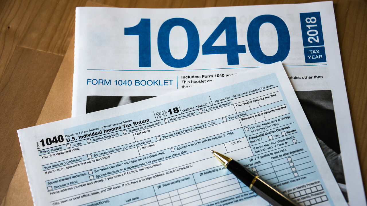 IRS tax form 1040 booklet i Stock 1125107320 — Postimages