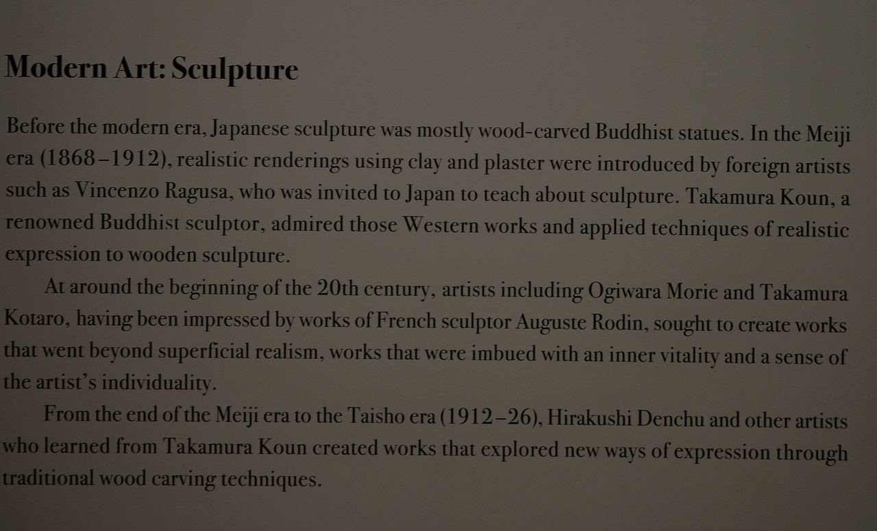 Informational sign about a monkey statue
