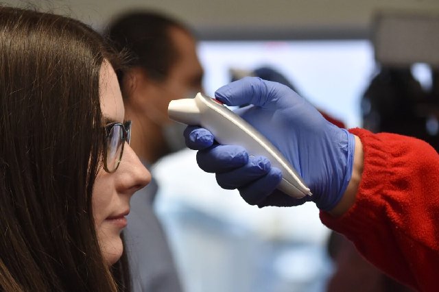 White House starts temperature checks for people around Trump or Pence…