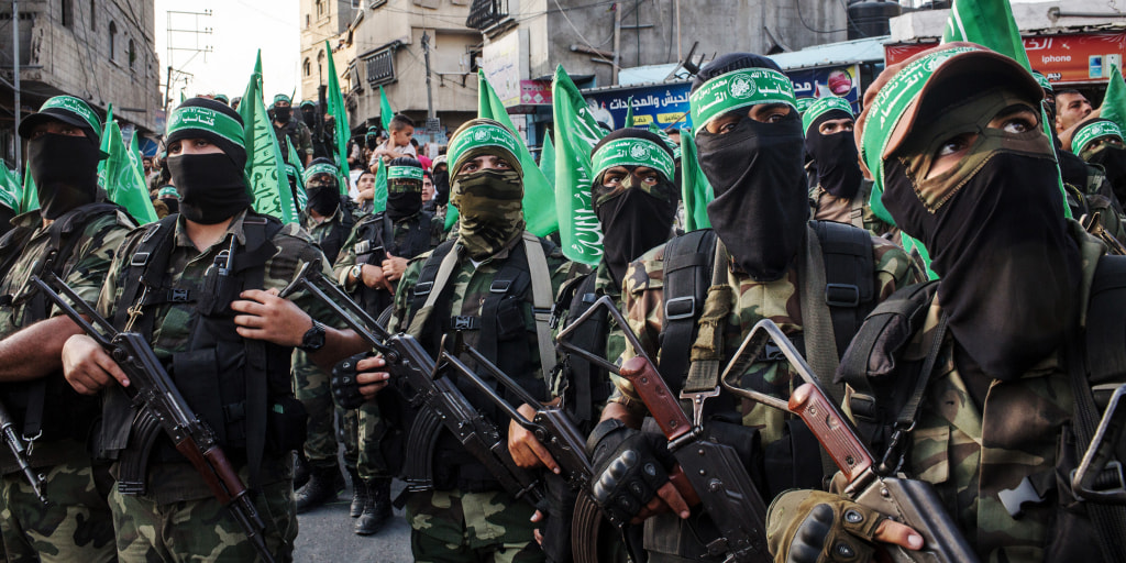 231009-gaza-city-hamas-fighters-masks-weapons-2017-ac-1108p-1bb51e.jpg