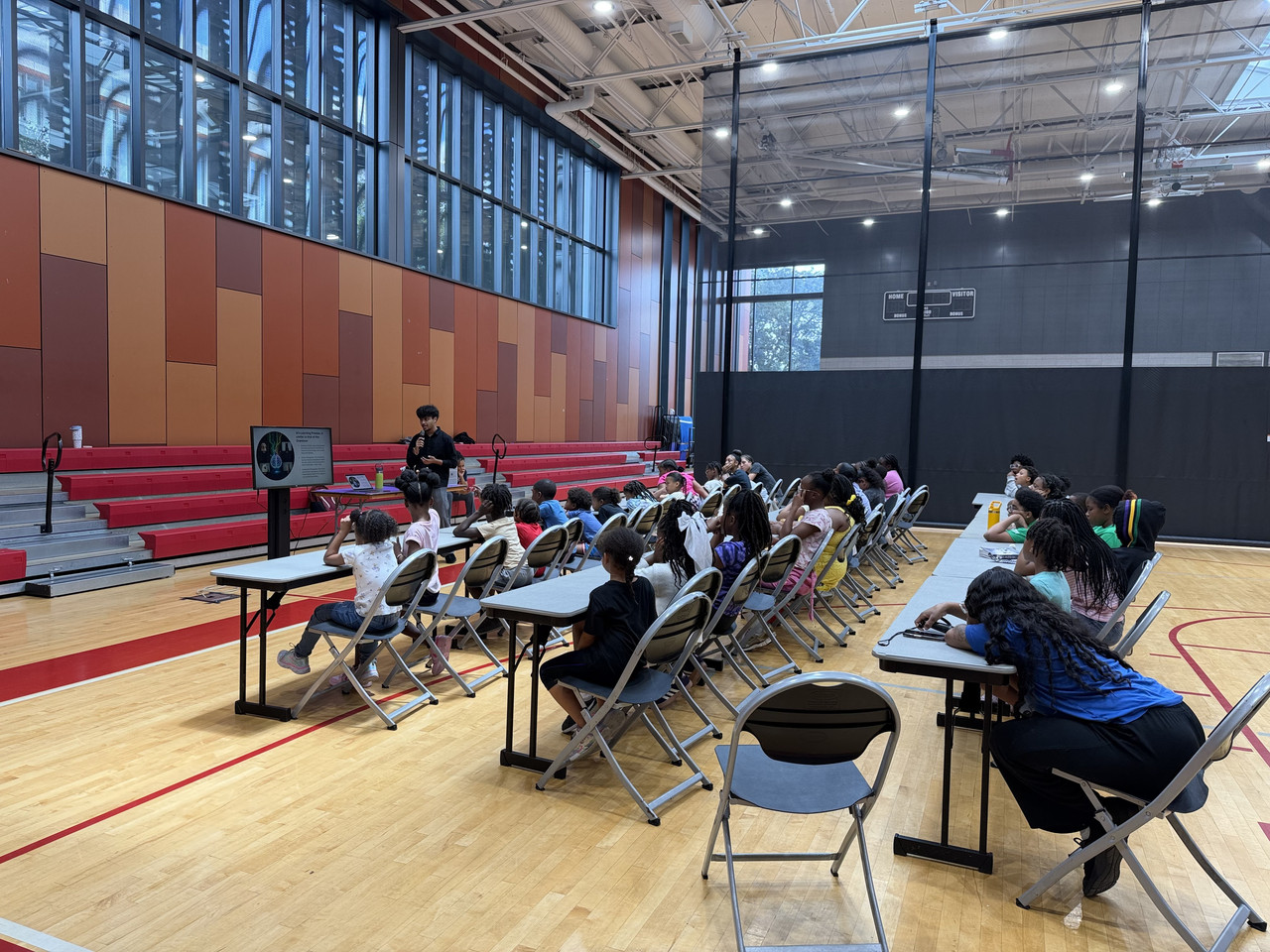 MAKE A DIFFERENCE AI Foundation camp highlighting youth engagement at Emancipation Park Cultural Center.
