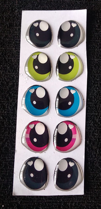 Ojos adhesivosde 1.5cm  para muñecos y artesanía x5pz