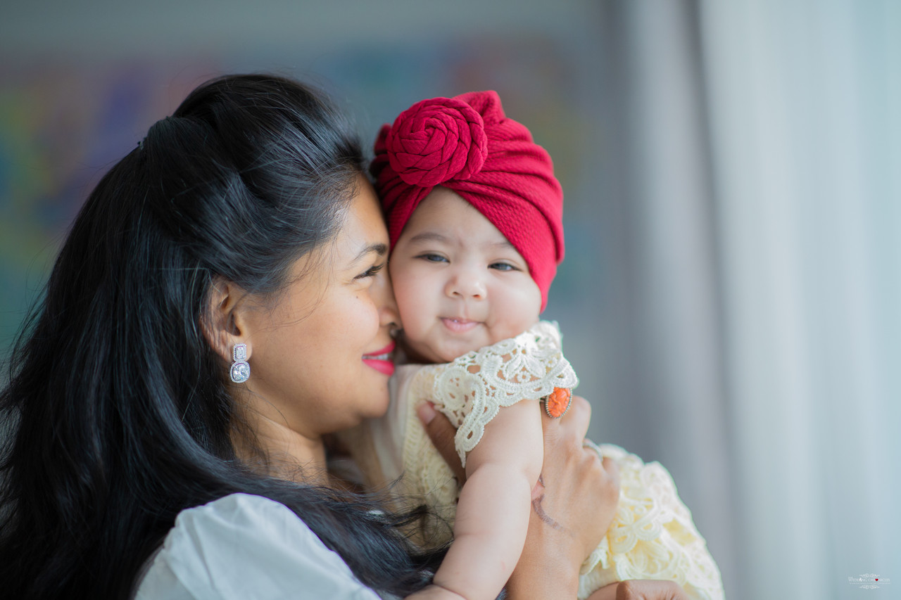 South Indian family photographer London — cinematic home session, natural light
