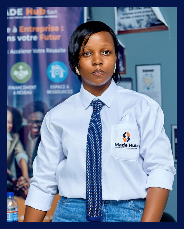 Linda Kabeya, Admin-Fin & Logistique of MADEHub, smiling professional in business attire