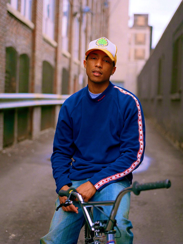 Pharrell Williams with his “1million dollar” bag. Ya think dudes