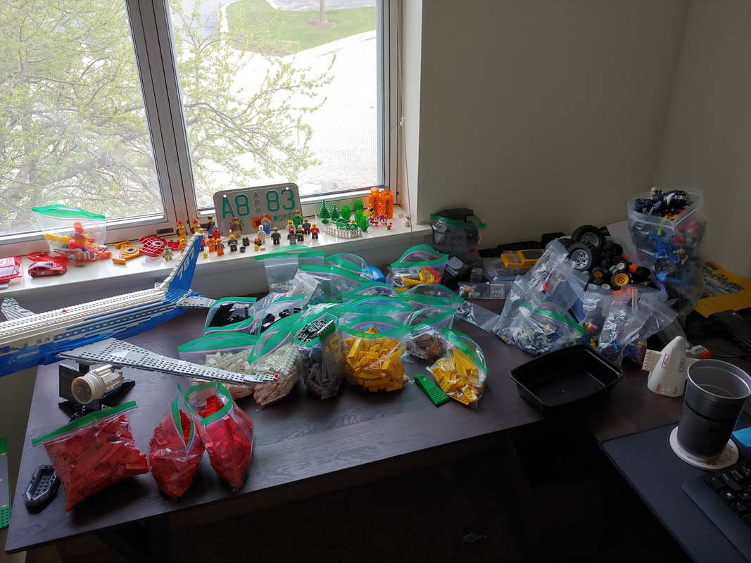 06. More bags. Minifig army is growing. Plane continues to be in the way.