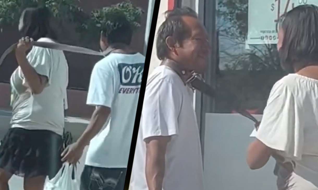 Mujer amarra con cinturón a un hombre y lo saca a “pasear” en la calle