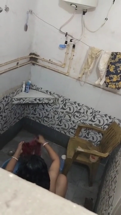 Chubby-Desi-Bhabhi-Washing-Caught-Hidden