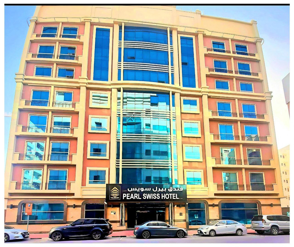 The modern exterior of Pearl Swiss Hotel Dubai, welcoming guests with style.