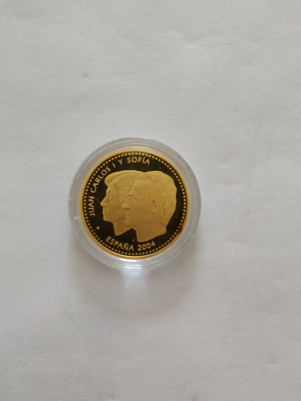 Dudas para limpiar esta moneda de oro conmemorativa IMG-20190714-WA0096