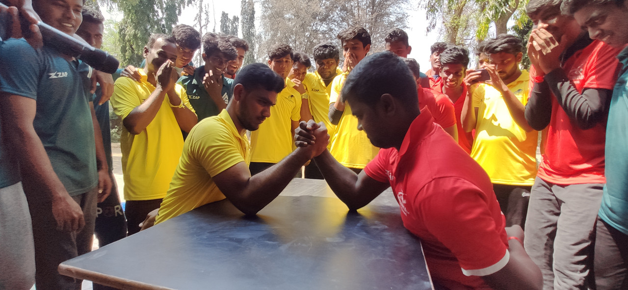 Students arm wrestling