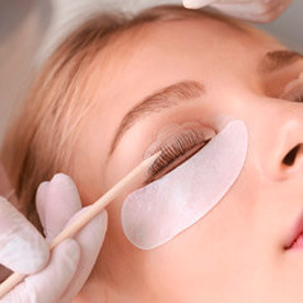 A close-up of eyelash extension tools.