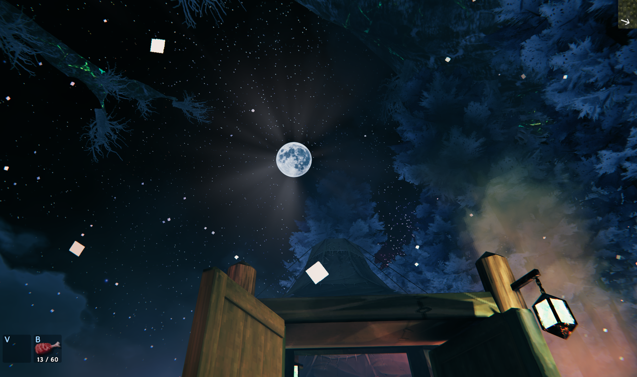 Ivory Moon above a snowy settlement