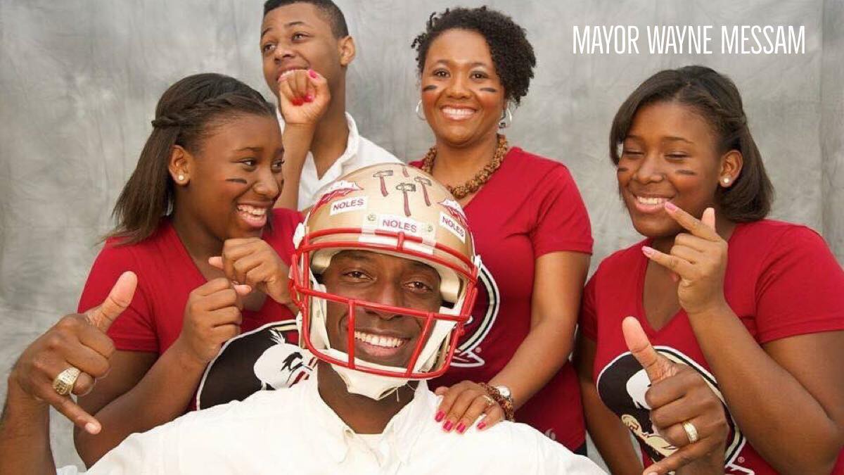 Wayne Messam with his wife and children