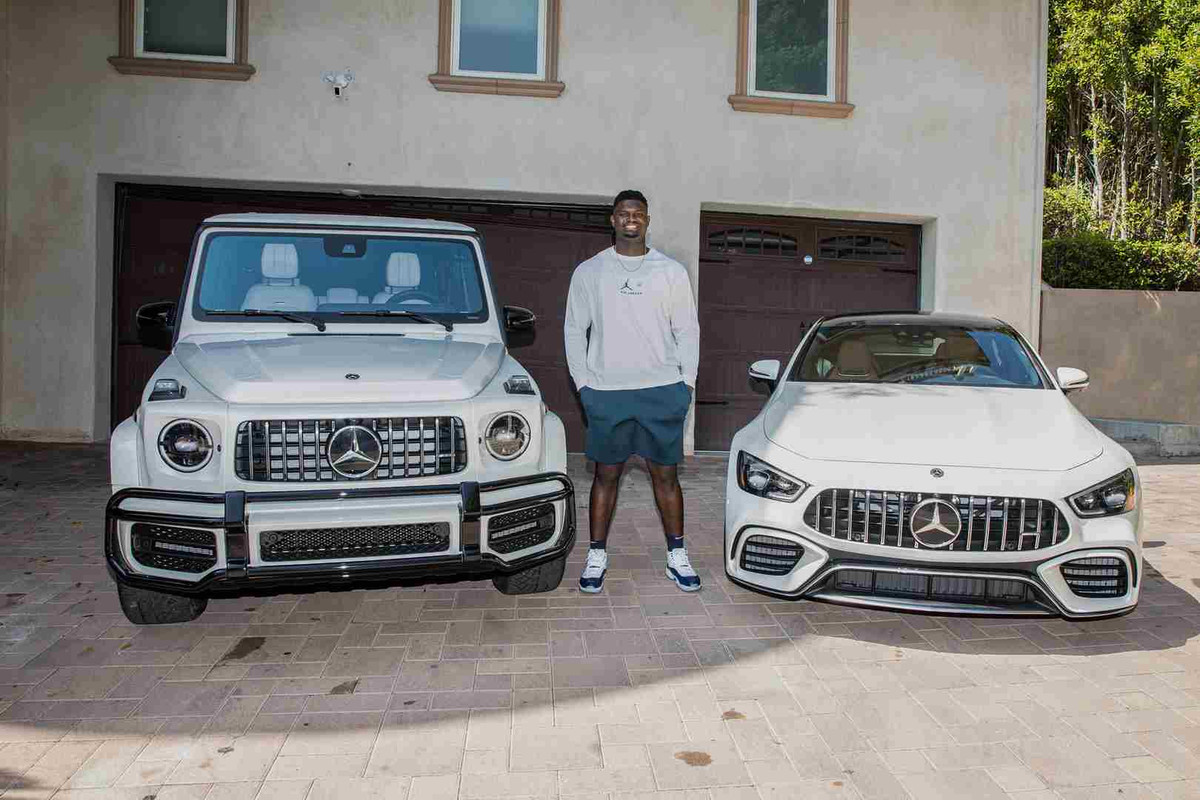 Zion with his G-wagon and AMG