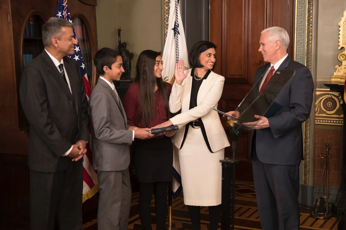 Seema Verma participates in a swearing-in ceremony with her husband and children, officiated by U.S. Vice President Mike Pence in the Vice Presidents ceremonial office at Eisenhower Executive Build