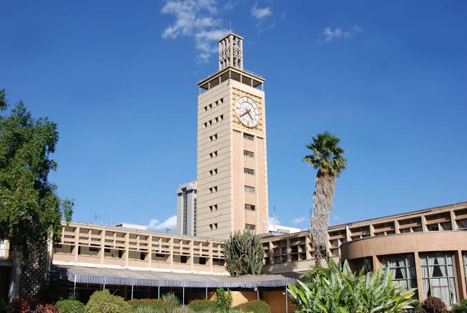 Kenya Parliament buildings at dusk with dramatic sky