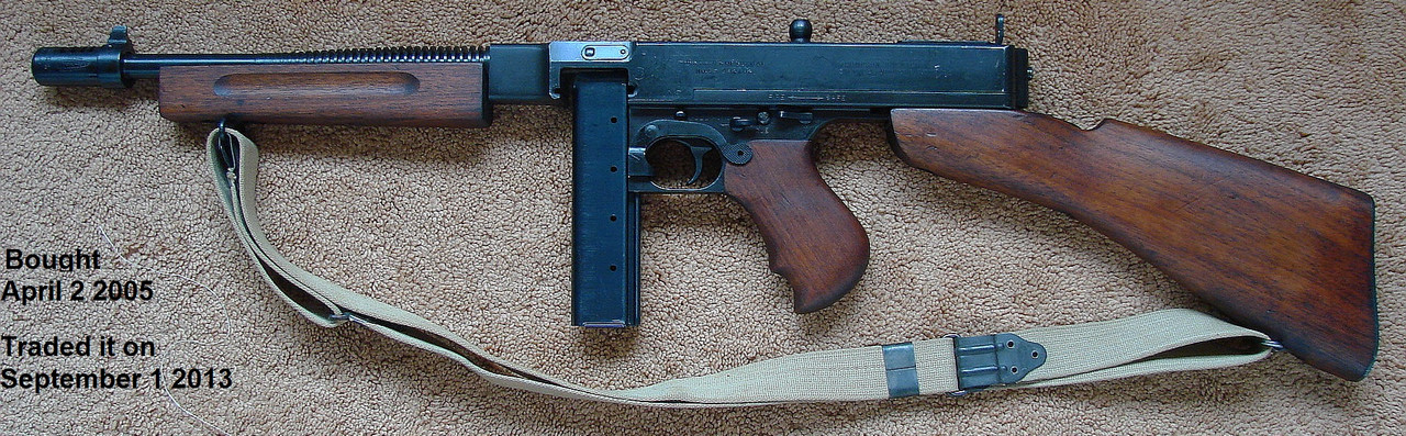 I traded this dewat  M1928A1 Thompson for a rare Remington-Rider DA New Model Belt Revolver with a f