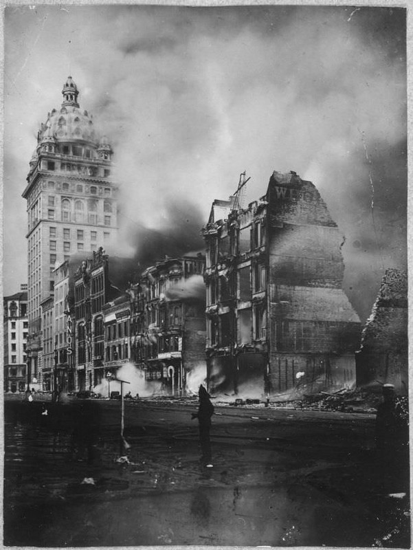 A-firefighter-stands-next-to-smouldering-buildings-after-the-great-earthquake-that-hit-San-Fransisco.jpg