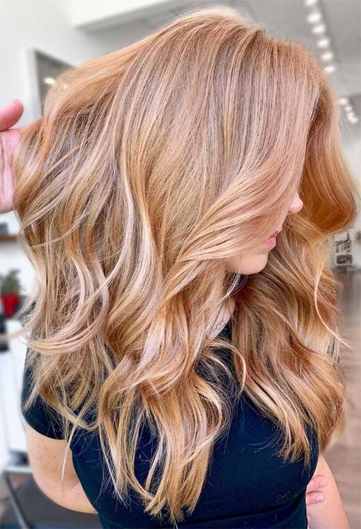 Thick wavy long strawberry blonde hair