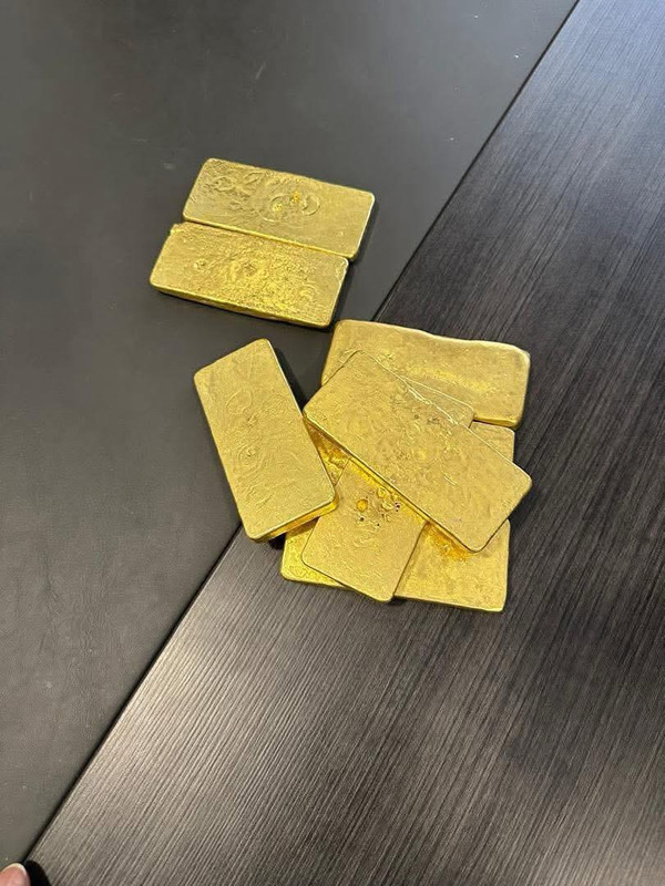 Smart Gold Investing - Gold Bars on Table