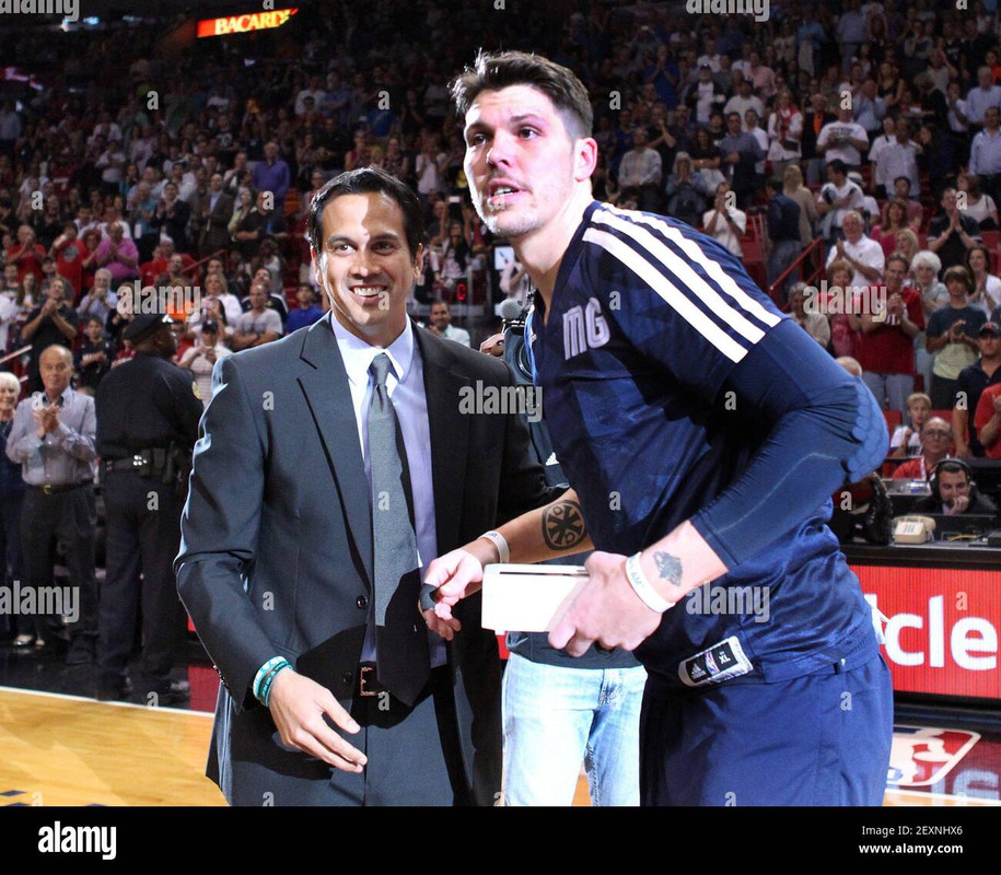 miami-heat-head-coach-erik-spoelstra-hands-over-the-championship-ring-to-former-heat-mike-miller-bef.jpg