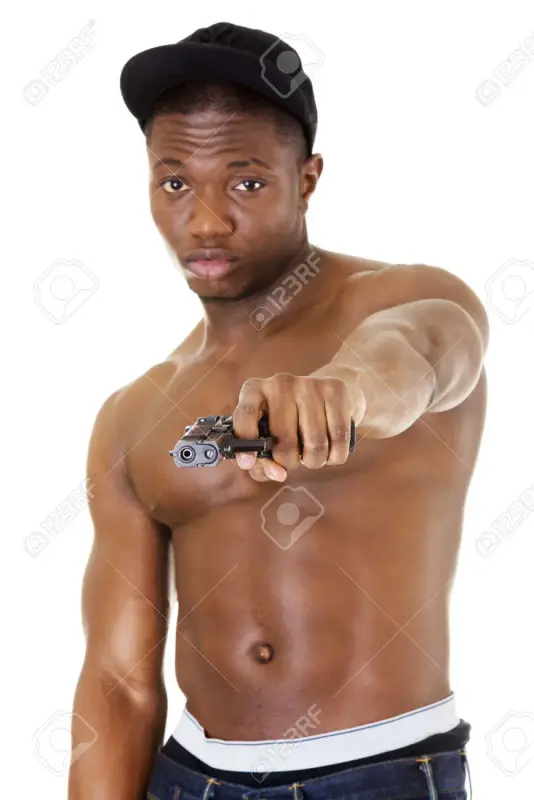 22466369-afro-american-man-standing-with-gun-in-hand-thug-and-gangsta-concept.webp