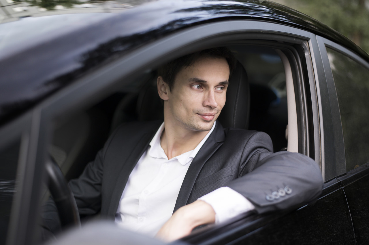 medium shot businessman incar
