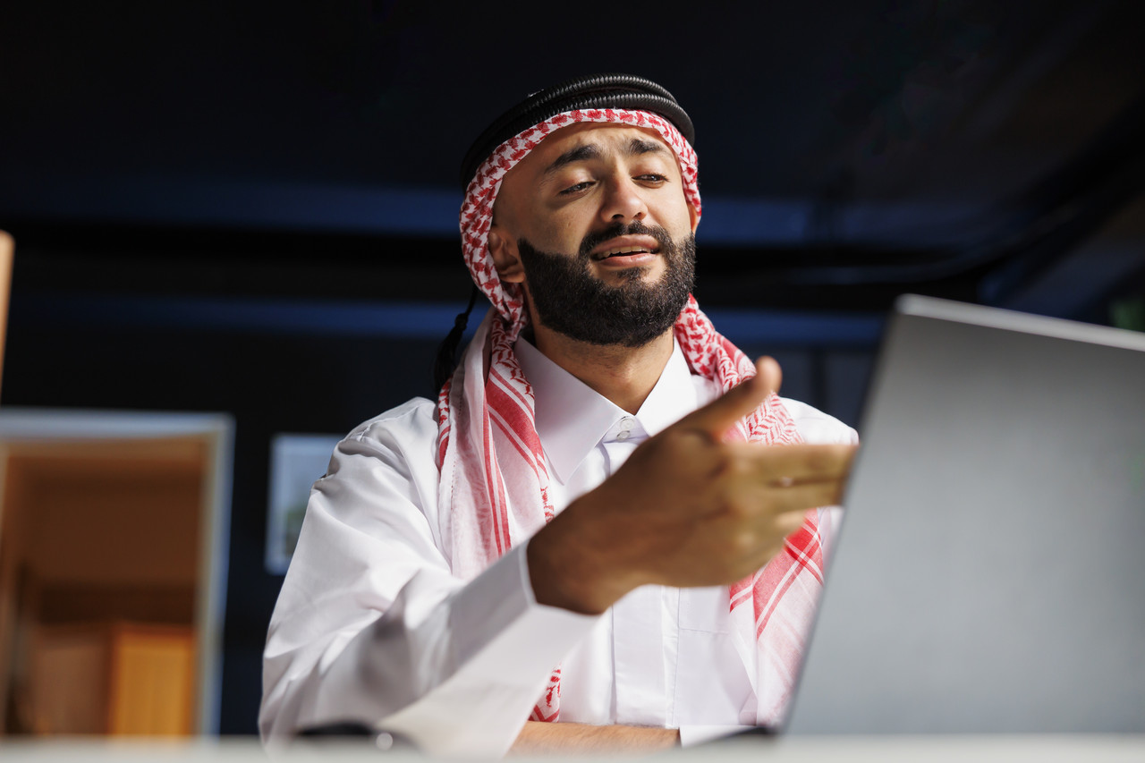 young businessman using digital laptop