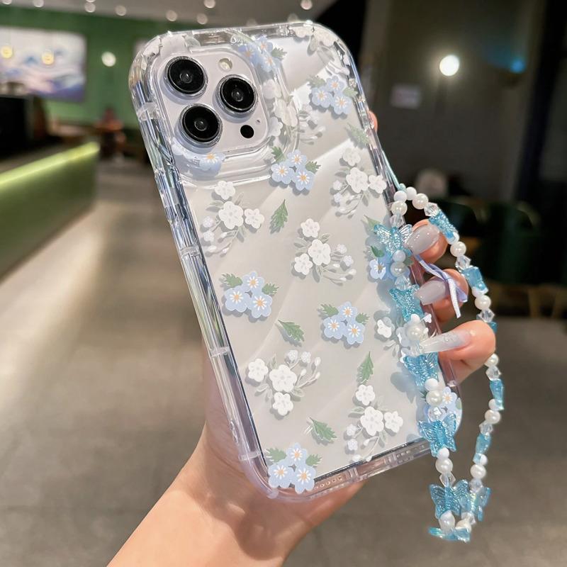 Foto de Funda transparente estampado floral. Incluye correa de mano.