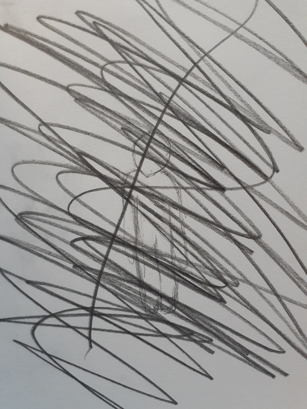 Pencil drawing of a blank figure behind a mass of black scribbles.