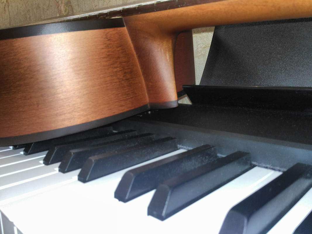 Крепление грифа