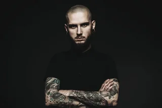 depositphotos-195065422-stock-photo-guy-with-tattooed-hands.webp