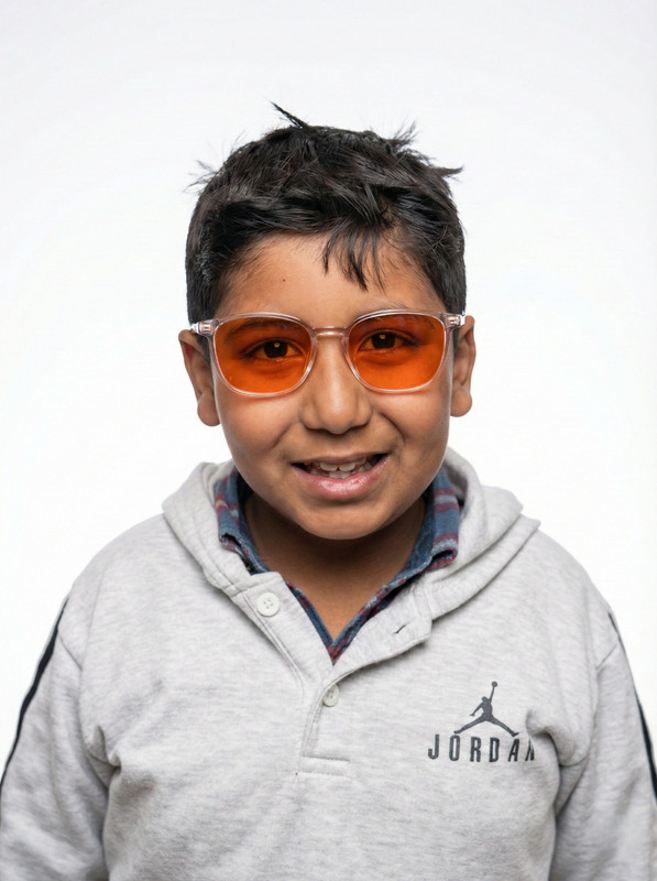 Kid wearing NoctiX Kids glasses