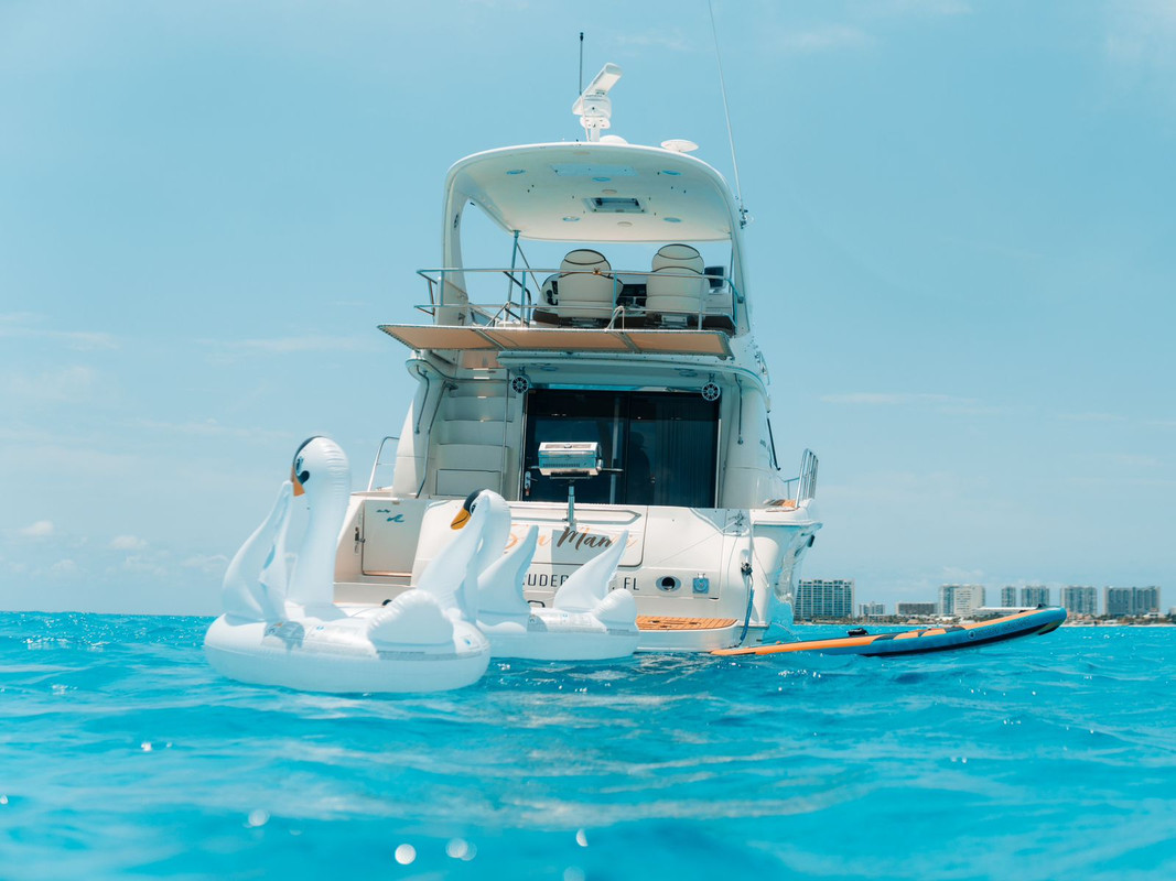 Sea Mami 52 ft boat rental Cancun - Deck area with snorkeling equipment and professional crew service