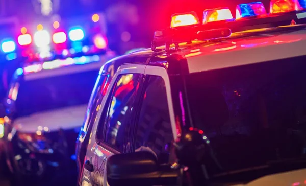 depositphotos-173996258-stock-photo-night-time-police-intervention.webp