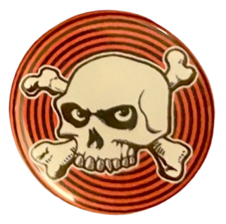 a pin with red & black circles in the background and a skull & crossbones in the center