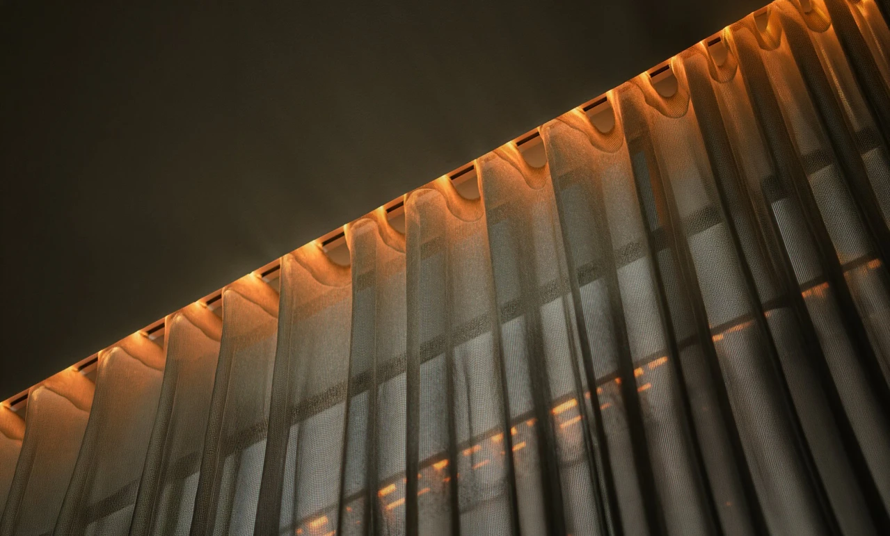 Sheer curtain lit from the integrated rail
