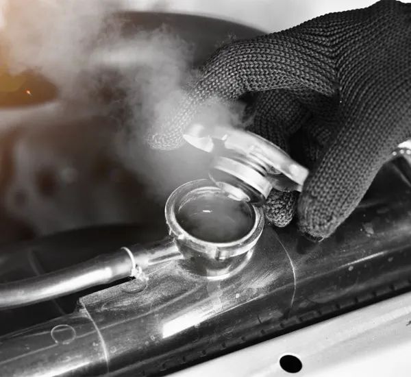 Steam coming from an open radiator cap