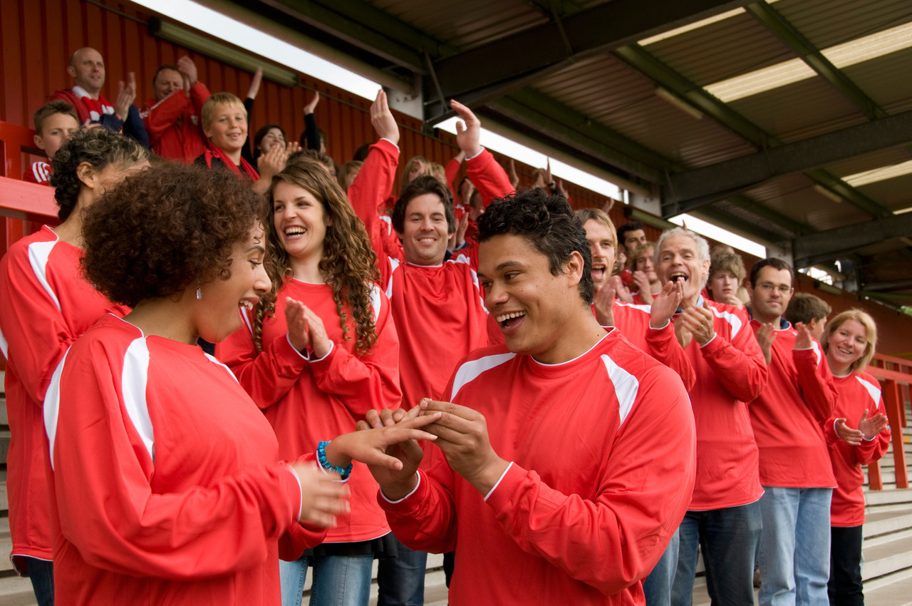 Couple celebrating at a game