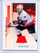 2003-04-ITG-Action-Jerseys-M-007-Radek-Bonk-Ottawa-Senators-Ruby-500-swatch-red-white-a