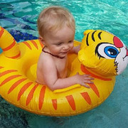 cute-toddler-on-his-4akid-tiger-swimming-floater